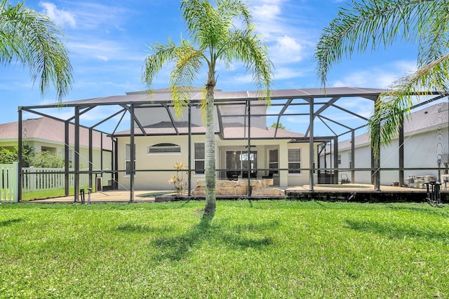 6364 Golden Eye Gln, Lakewood Ranch, FL 34202 - back of house featuring a lanai, stucco siding, and a yard