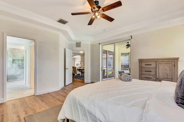 6364 Golden Eye Gln, Lakewood Ranch, FL 34202 - bedroom featuring light wood-type flooring, arched walkways, crown molding, access to exterior, and a ceiling fan