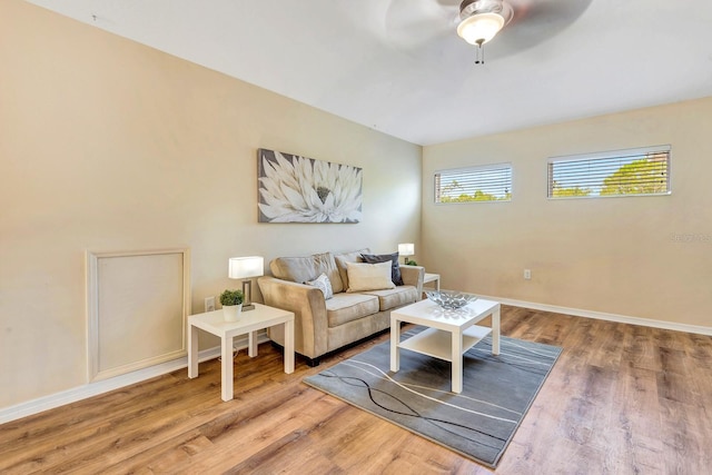 6364 Golden Eye Gln, Lakewood Ranch, FL 34202 - living area featuring wood finished floors and a ceiling fan