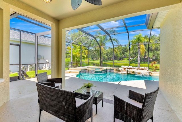 6364 Golden Eye Gln, Lakewood Ranch, FL 34202 - view of pool with a pool with connected hot tub, a patio area, a lanai, and view of scattered trees