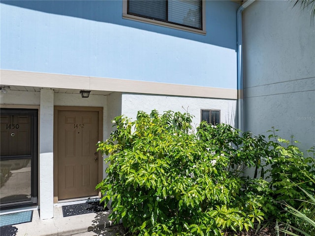 1452 SW 25th Pl Unit D4, Gainesville, FL 32608 - entrance to property with stucco siding
