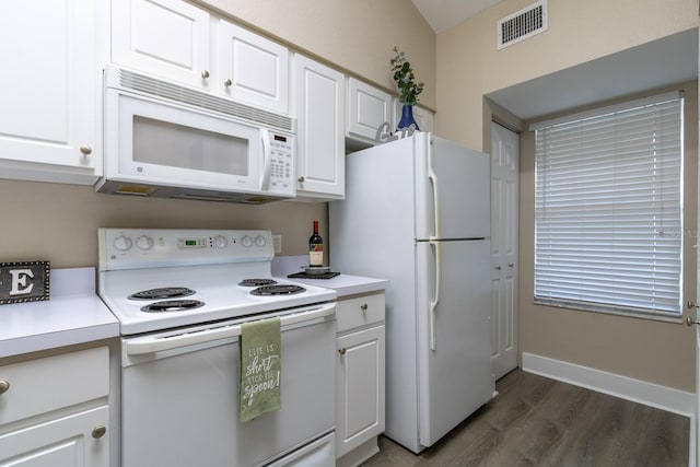 9177 SW 52nd Rd Unit E302, Gainesville, FL 32608 - kitchen with white appliances, dark wood-style floors, white cabinetry, and light countertops