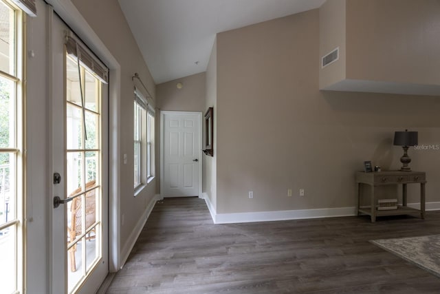 9177 SW 52nd Rd Unit E302, Gainesville, FL 32608 - doorway to outside featuring wood finished floors and high vaulted ceiling