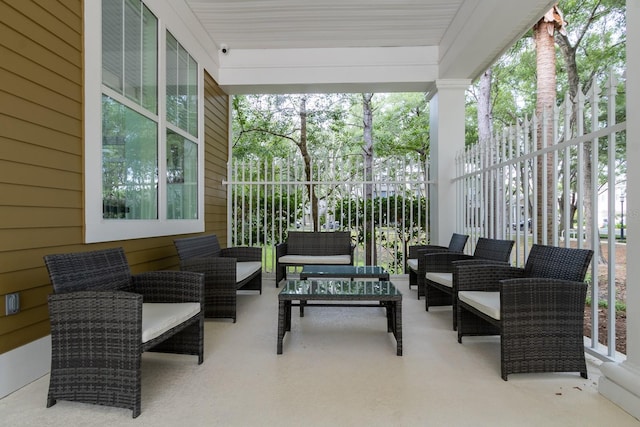 9177 SW 52nd Rd Unit E302, Gainesville, FL 32608 - view of patio / terrace featuring outdoor lounge area