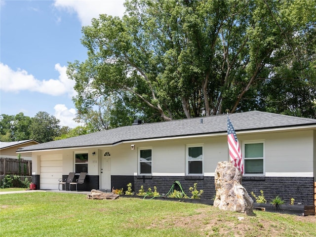 2826 NE 18th Ct, Ocala, FL 34470 - ranch-style home featuring an attached garage, a shingled roof, and brick siding