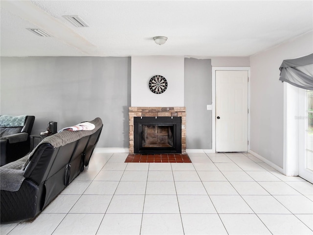 2826 NE 18th Ct, Ocala, FL 34470 - office area with a stone fireplace and light tile patterned flooring