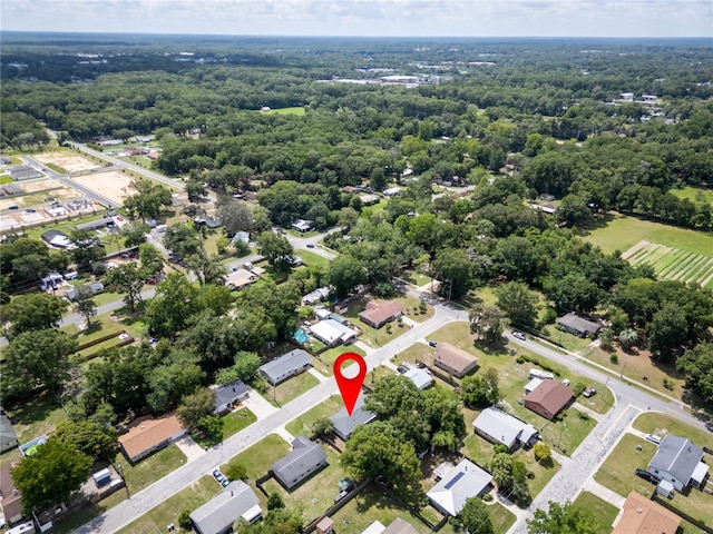2826 NE 18th Ct, Ocala, FL 34470 - aerial overview of property's location with a heavily wooded area