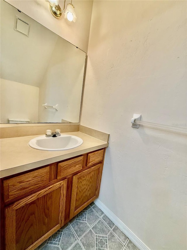3901 SW 20th Ave Unit 611, Gainesville, FL 32607 - bathroom with vanity and tile patterned floors