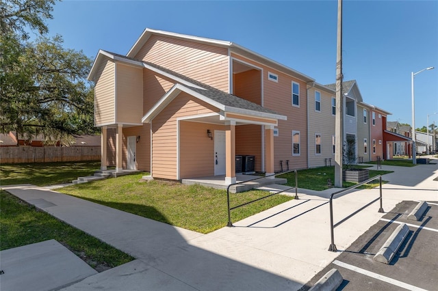 1581 NW 29th Rd Unit 4, Gainesville, FL 32605 - view of front of house with a residential view and a porch