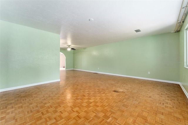 4700 NW 19th Pl, Gainesville, FL 32605 - empty room with arched walkways and a ceiling fan