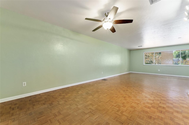 4700 NW 19th Pl, Gainesville, FL 32605 - spare room with a ceiling fan and baseboards