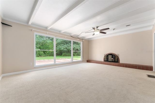 4700 NW 19th Pl, Gainesville, FL 32605 - unfurnished living room featuring beam ceiling, carpet flooring, and a ceiling fan
