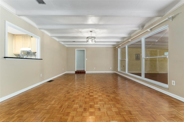4700 NW 19th Pl, Gainesville, FL 32605 - empty room featuring beam ceiling and a chandelier