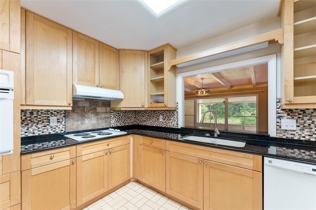 4700 NW 19th Pl, Gainesville, FL 32605 - kitchen with white appliances, under cabinet range hood, light brown cabinets, decorative backsplash, and glass insert cabinets