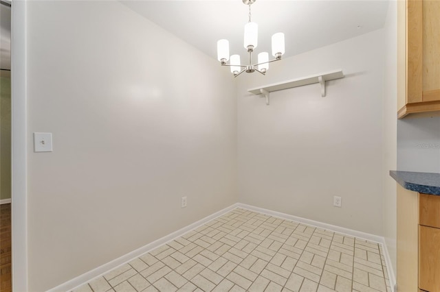 4700 NW 19th Pl, Gainesville, FL 32605 - unfurnished dining area with a chandelier and brick patterned floors