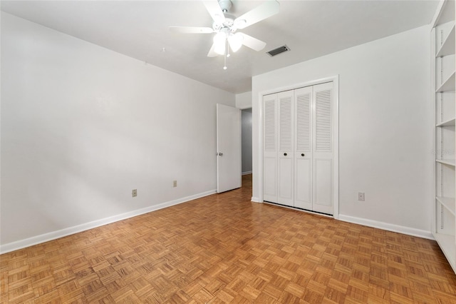 4700 NW 19th Pl, Gainesville, FL 32605 - unfurnished bedroom with a closet and a ceiling fan