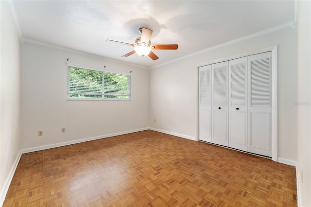 4700 NW 19th Pl, Gainesville, FL 32605 - unfurnished bedroom featuring ornamental molding, a closet, and ceiling fan