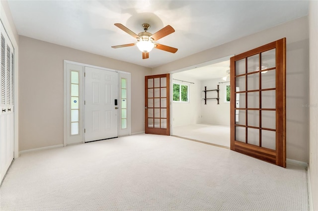 4700 NW 19th Pl, Gainesville, FL 32605 - foyer with carpet flooring and ceiling fan