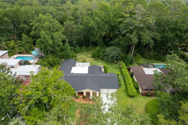 4700 NW 19th Pl, Gainesville, FL 32605 - aerial view of property and surrounding area featuring a pool and a forest