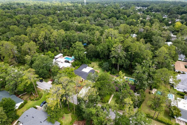 4700 NW 19th Pl, Gainesville, FL 32605 - aerial overview of property's location with a forest