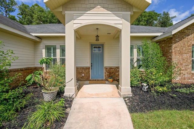 6316 SW 50th St, Gainesville, FL 32608 - entrance to property with brick siding and roof with shingles
