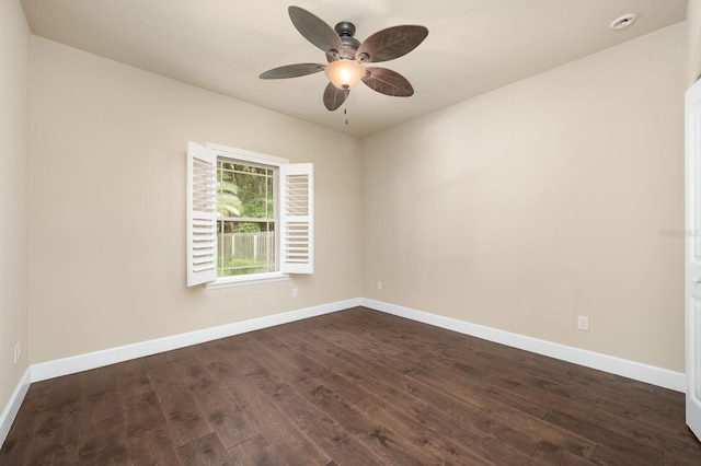 6316 SW 50th St, Gainesville, FL 32608 - spare room with dark wood-style flooring, ceiling fan, and a smoke detector