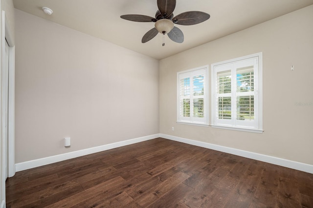 6316 SW 50th St, Gainesville, FL 32608 - spare room featuring dark wood-style flooring, a smoke detector, and ceiling fan