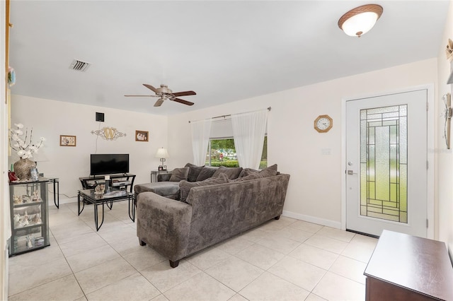 3331 NW 30th Ave, Gainesville, FL 32605 - living room featuring ceiling fan and light tile patterned floors