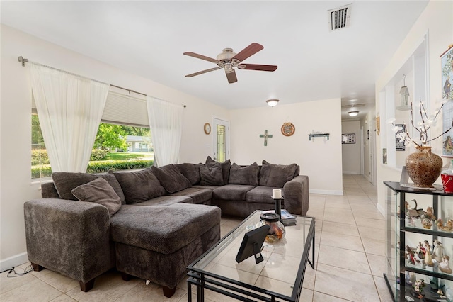 3331 NW 30th Ave, Gainesville, FL 32605 - living room featuring ceiling fan and light tile patterned flooring