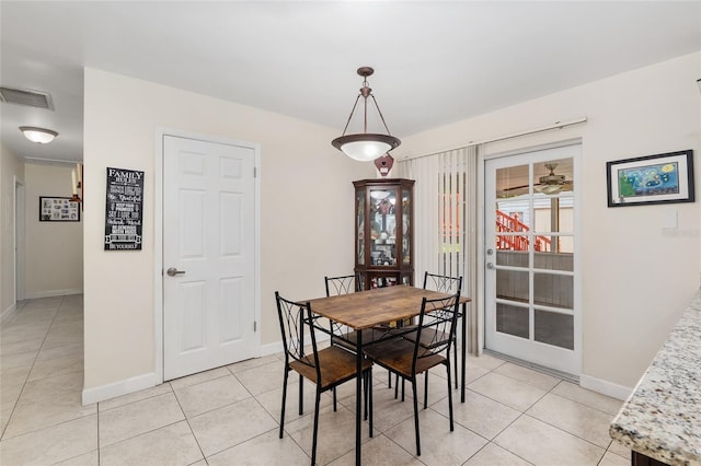 3331 NW 30th Ave, Gainesville, FL 32605 - dining area featuring light tile patterned floors and ceiling fan