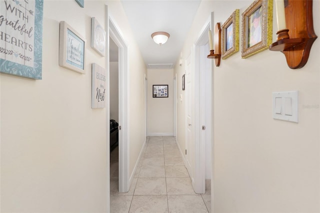 3331 NW 30th Ave, Gainesville, FL 32605 - hall featuring light tile patterned floors and baseboards