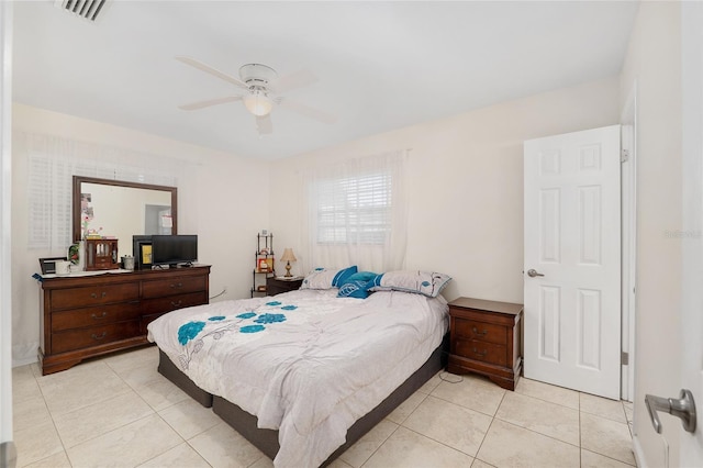 3331 NW 30th Ave, Gainesville, FL 32605 - bedroom with light tile patterned floors and ceiling fan