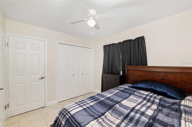 3331 NW 30th Ave, Gainesville, FL 32605 - bedroom featuring light tile patterned flooring, a closet, and a ceiling fan