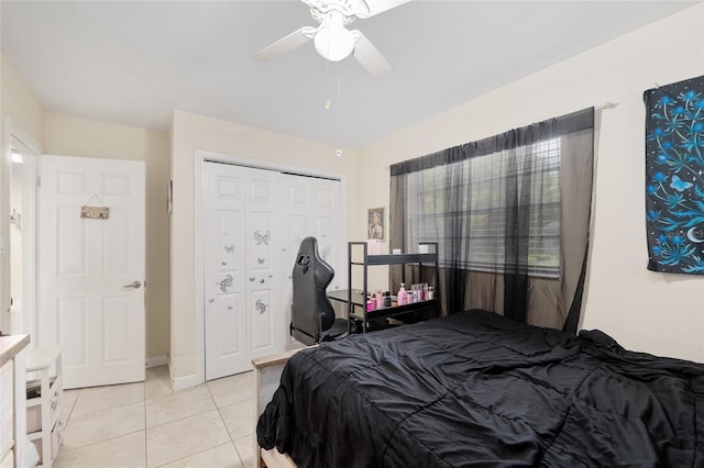 3331 NW 30th Ave, Gainesville, FL 32605 - bedroom featuring light tile patterned flooring, a closet, and a ceiling fan