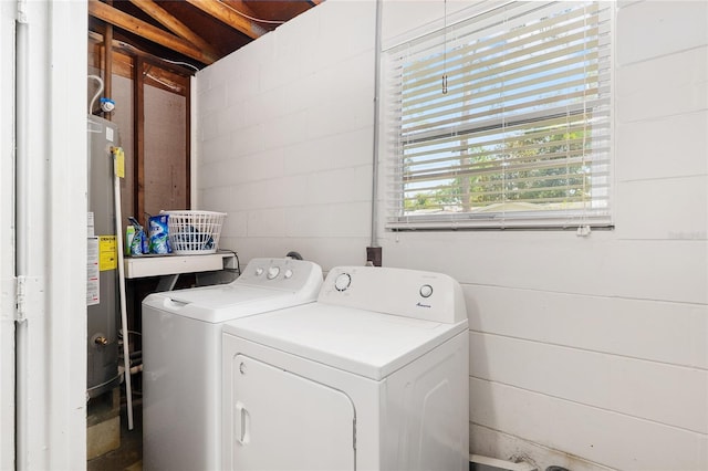 3331 NW 30th Ave, Gainesville, FL 32605 - washroom featuring washing machine and dryer and concrete block wall