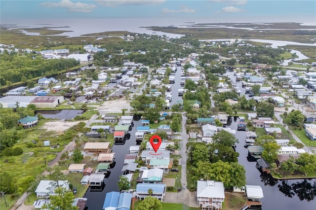 78 SE 901st Ave, Suwannee, FL 32692 - aerial overview of property's location with a large body of water and nearby suburban area