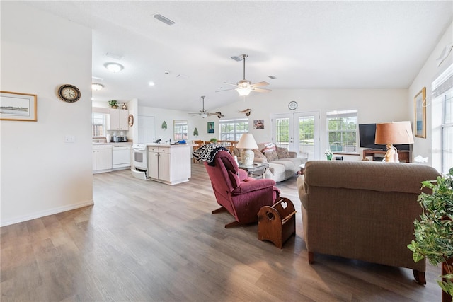 78 SE 901st Ave, Suwannee, FL 32692 - living room with a ceiling fan, vaulted ceiling, and light wood-style floors