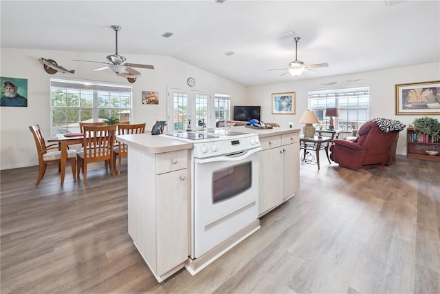 78 SE 901st Ave, Suwannee, FL 32692 - kitchen with a ceiling fan, white electric range oven, open floor plan, light wood-type flooring, and vaulted ceiling