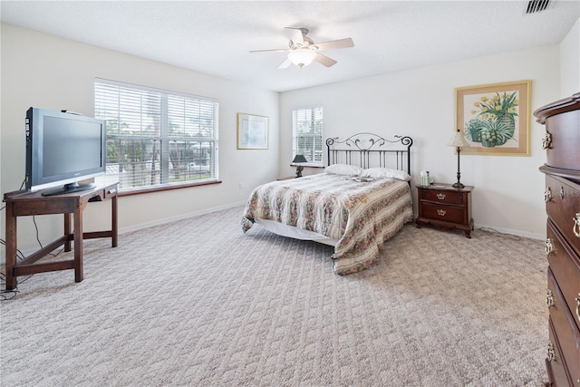 78 SE 901st Ave, Suwannee, FL 32692 - bedroom with carpet floors and a ceiling fan