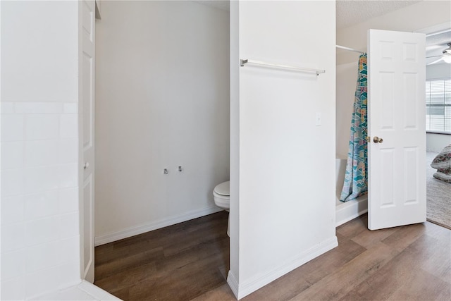 78 SE 901st Ave, Suwannee, FL 32692 - full bathroom with wood finished floors, ceiling fan, and a shower with curtain