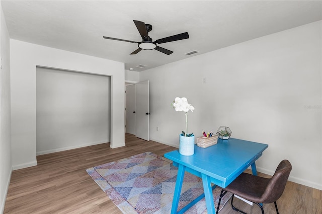 2330 NW 54th Ter, Gainesville, FL 32606 - office space featuring wood finished floors and ceiling fan