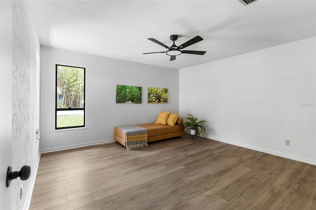 2330 NW 54th Ter, Gainesville, FL 32606 - sitting room featuring wood finished floors and a ceiling fan