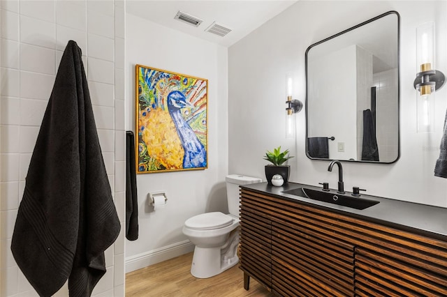 2330 NW 54th Ter, Gainesville, FL 32606 - full bath featuring wood finished floors and vanity