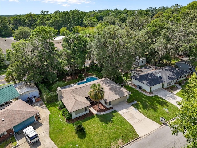 2330 NW 54th Ter, Gainesville, FL 32606 - view from above of property with a heavily wooded area