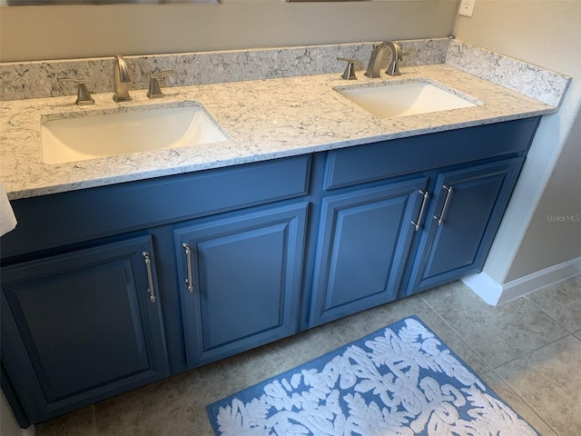 2048 Bristol Grande Way, Orlando, FL 32820 - bathroom with double vanity and tile patterned flooring