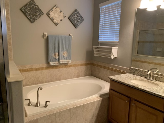 2048 Bristol Grande Way, Orlando, FL 32820 - full bathroom with vanity, a bath, and a shower stall