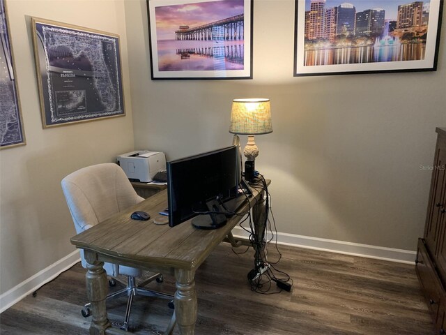 2048 Bristol Grande Way, Orlando, FL 32820 - home office featuring baseboards and wood finished floors
