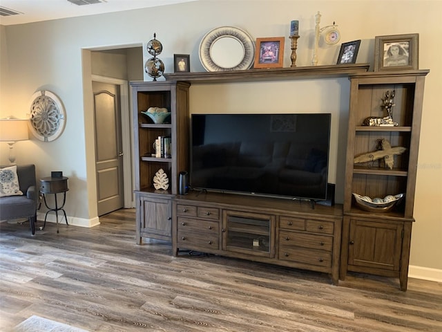 2048 Bristol Grande Way, Orlando, FL 32820 - living area featuring wood finished floors and baseboards