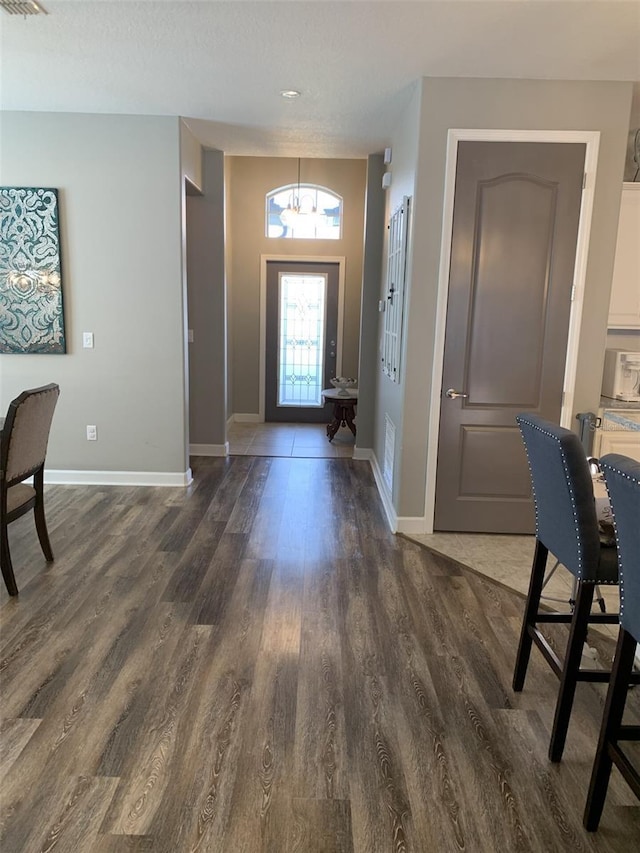 2048 Bristol Grande Way, Orlando, FL 32820 - foyer entrance with a chandelier and wood finished floors