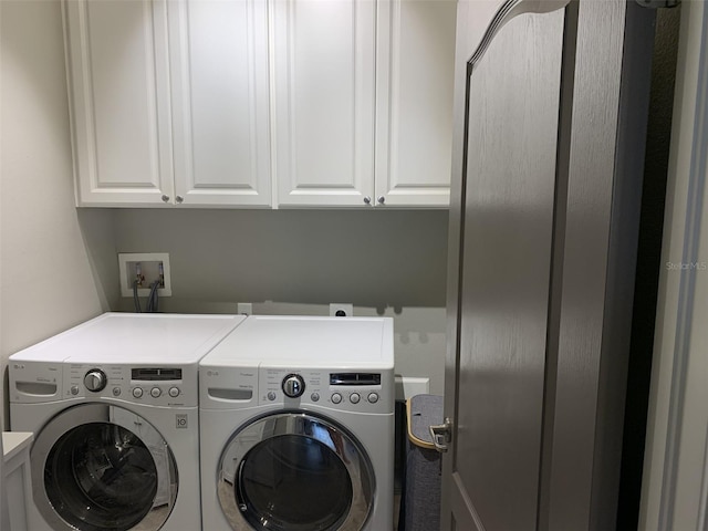 2048 Bristol Grande Way, Orlando, FL 32820 - laundry room with washer and dryer and cabinet space